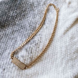 Golden chain necklace with sparkling accent